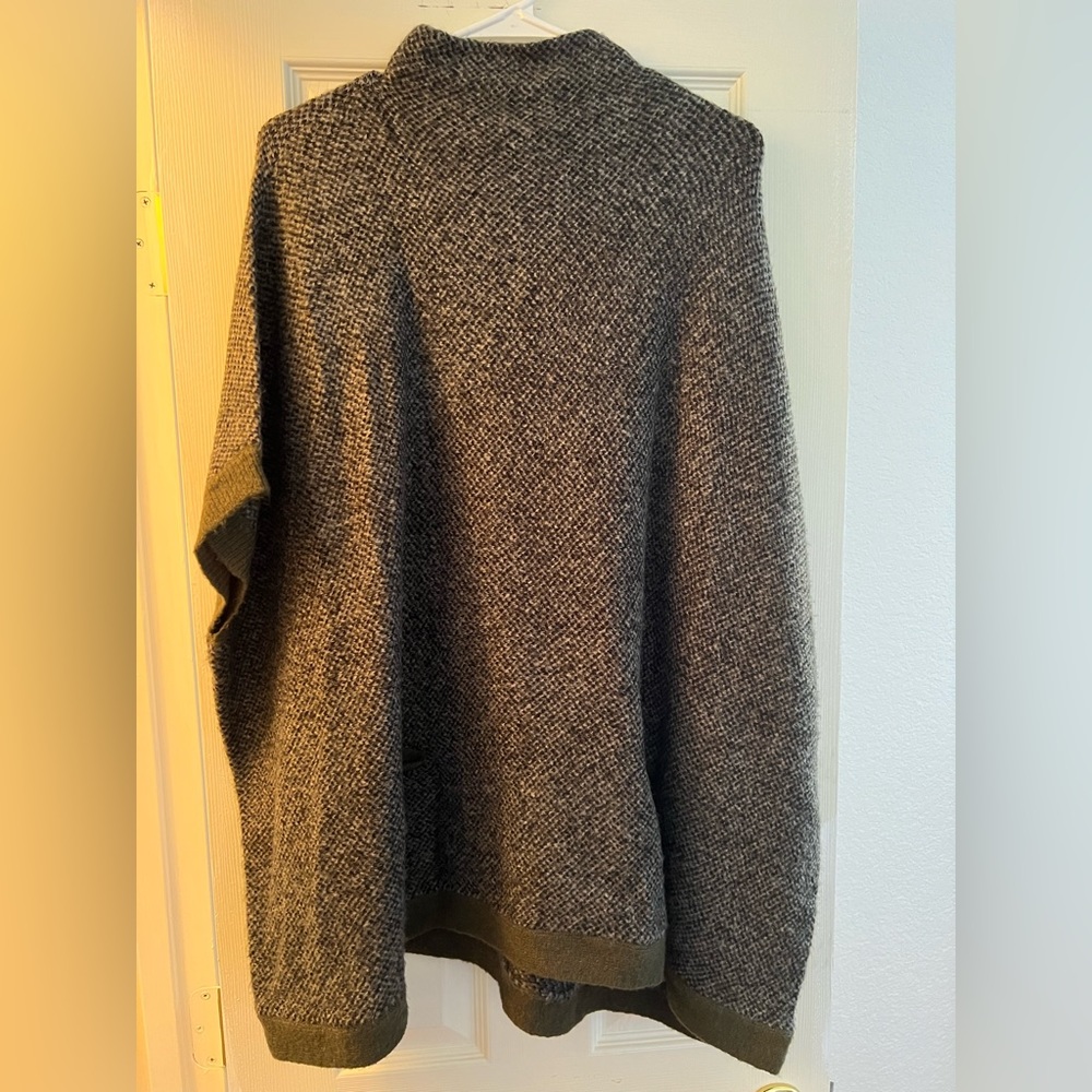 Francesca’s sweater poncho, worn once. No sleeves, with pockets. Size s/m